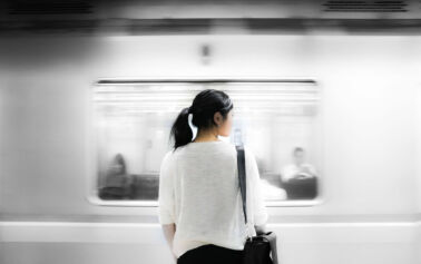 woman waiting for subway train
