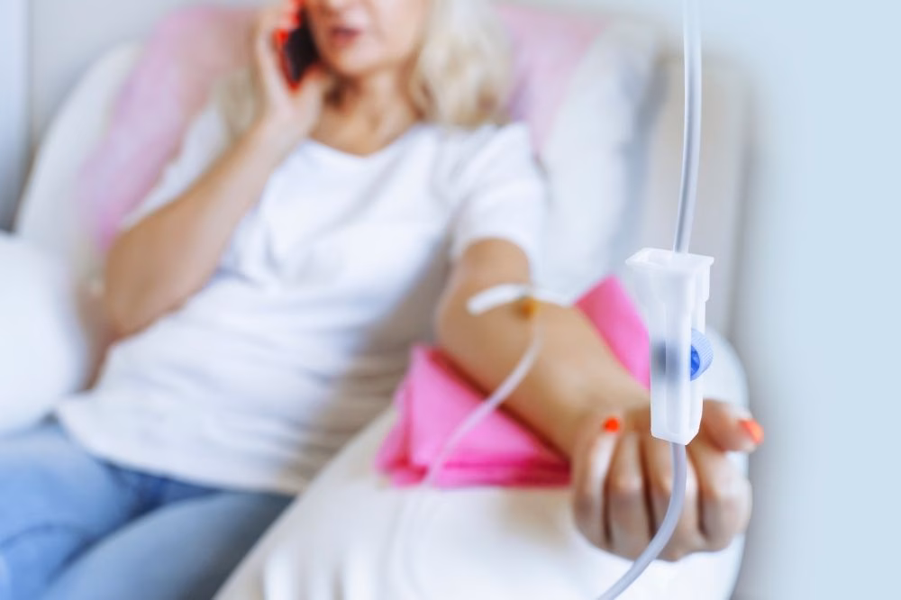 A photo of a patient receiving IV therapy