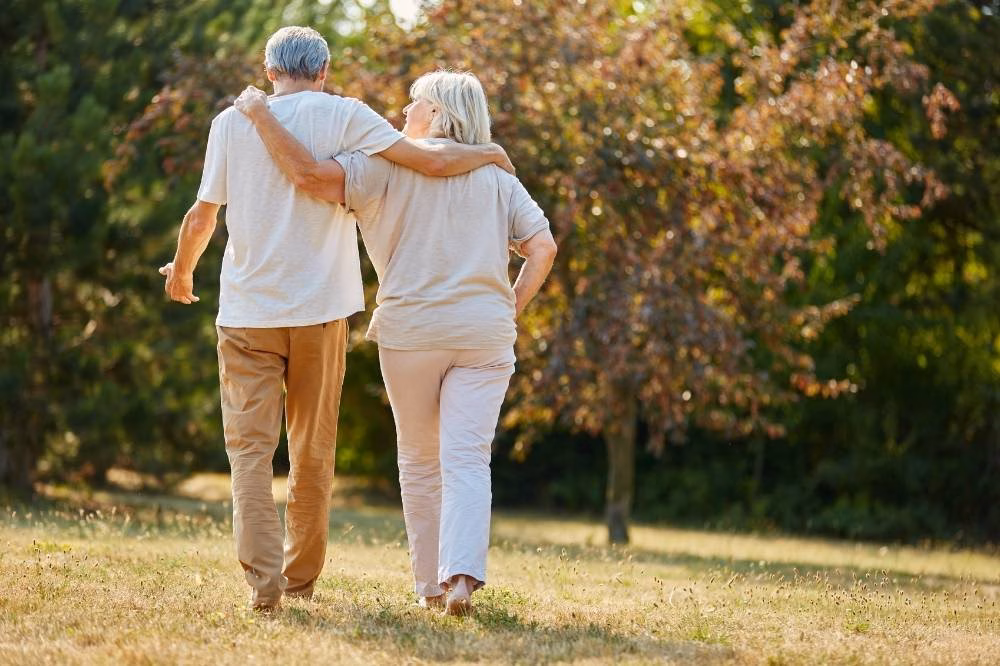 A photo of patients walking together after successful treatments.
